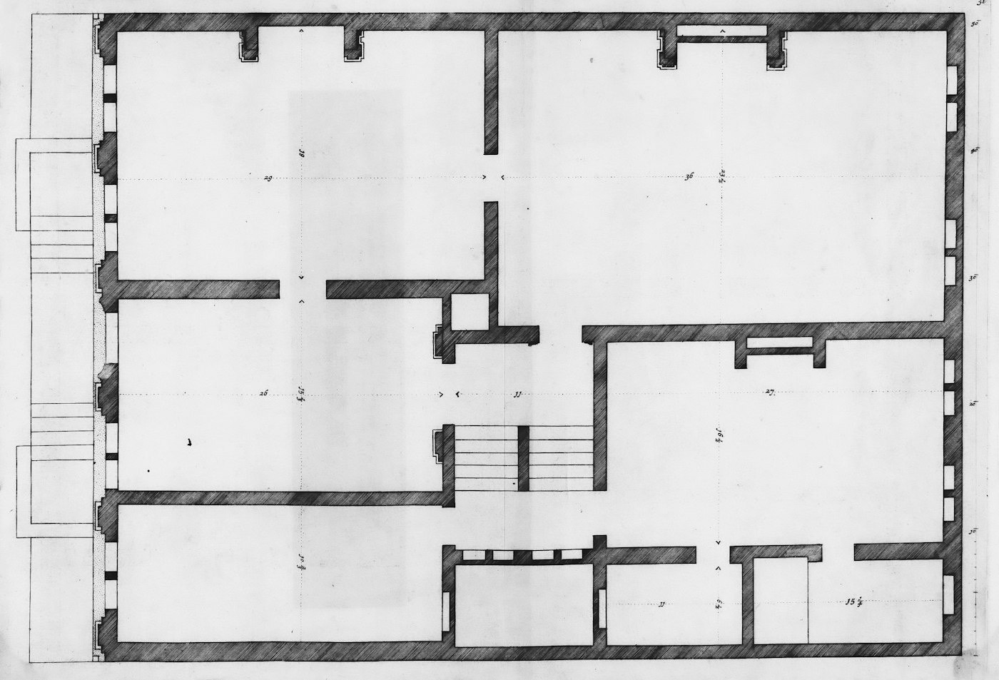 A measured floor plan of a home, drawn in black ink